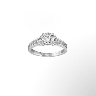 Paved Ballerine Solitaire The name of this solitaire evokes the world of dance, harmony and balance. The setting provides a delicate, feminine backdrop to the diamond.