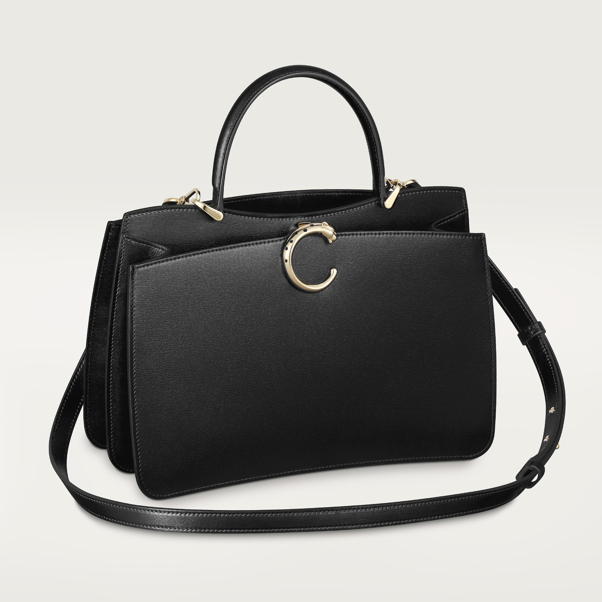 Top handle bag small model, Panthère de CartierBlack calfskin, golden finish