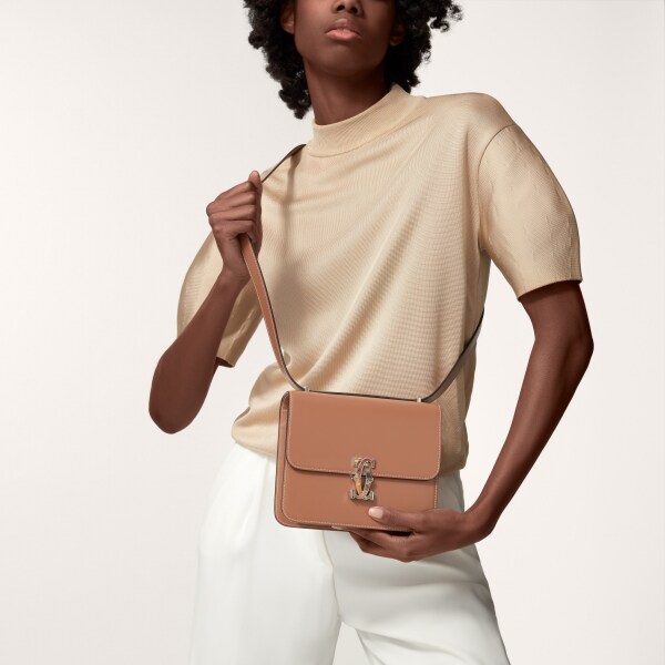 Mini shoulder bag, C de Cartier Tan calfskin, palladium finish and recycled acetate