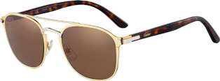 C de Cartier Sunglasses Combined golden and black, matt golden-finish frame, smooth palladium-finish bridge, brown lenses.