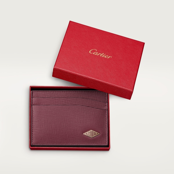Double card holder, Cartier Losange Burgundy grained calfskin, golden finish and burgundy enamel