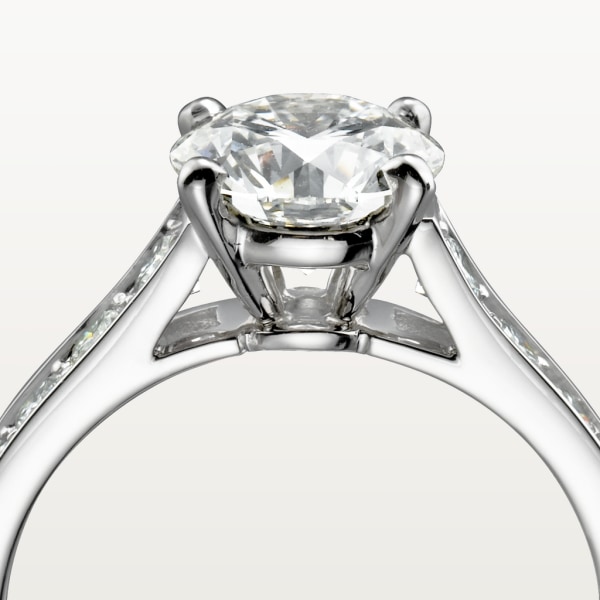 1895 solitaire, brilliant-cut diamond, paved   Platinum, diamonds
