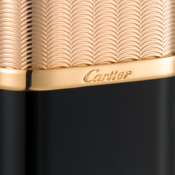 Oval lighter with guilloché motif Black composite, rose-gold finish