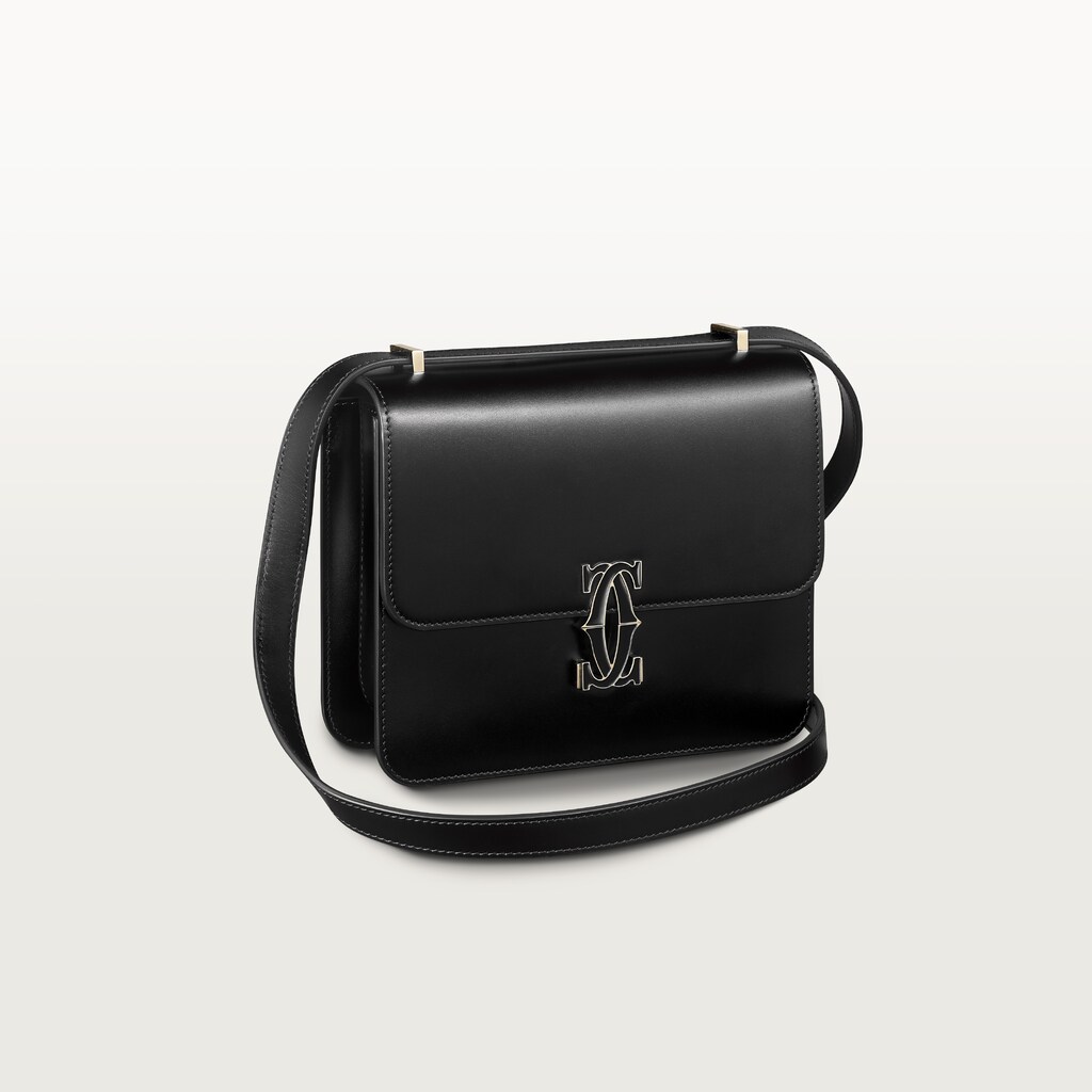 Mini shoulder bag, C de CartierBlack calfskin, gold and black enamel finish