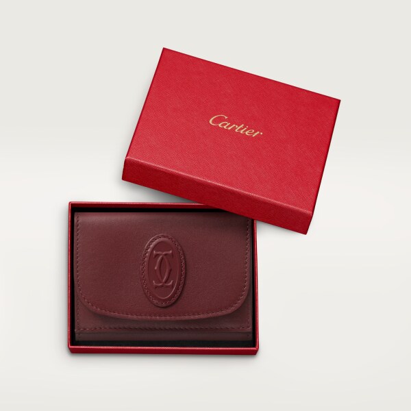 Trifold Wallet, Must de Cartier Burgundy calfskin, golden finish