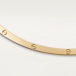 <span class='lovefont'>A </span> torque necklace Yellow gold