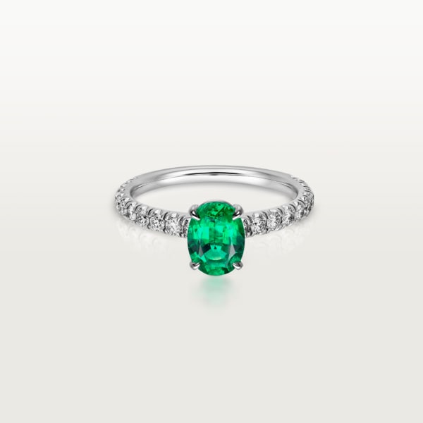 1895 solitaire, oval-cut emerald, paved  Platinum, emerald, diamonds