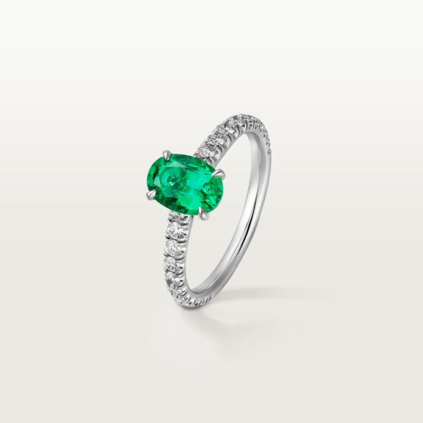 1895 solitaire, oval-cut emerald, paved  Platinum, emerald, diamonds