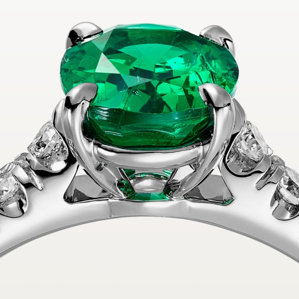 1895 solitaire, oval-cut emerald, paved  Platinum, emerald, diamonds