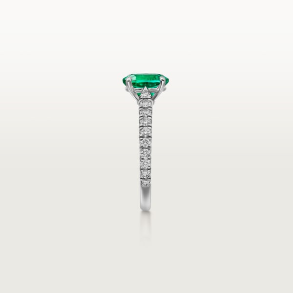 1895 solitaire, oval-cut emerald, paved  Platinum, emerald, diamonds
