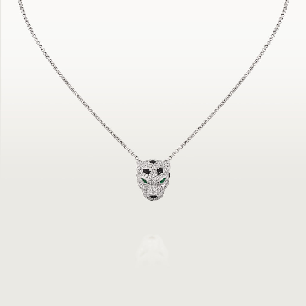 Panthère de Cartier pendant, pavedWhite gold, onyx, emeralds, diamonds