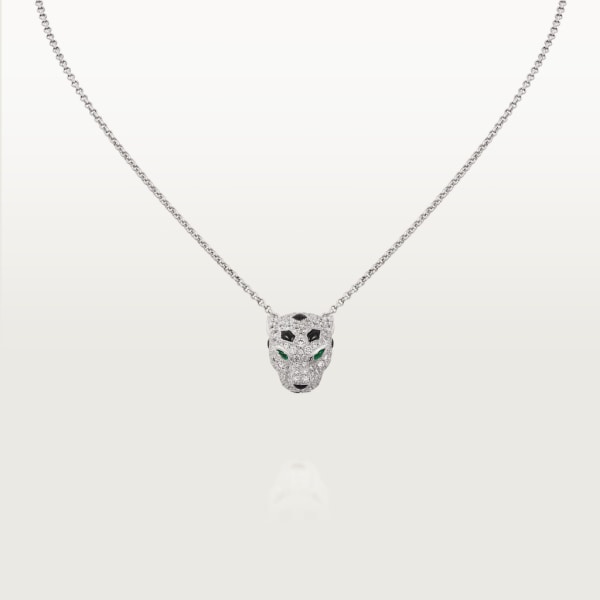 Panthère de Cartier pendant, paved White gold, onyx, emeralds, diamonds
