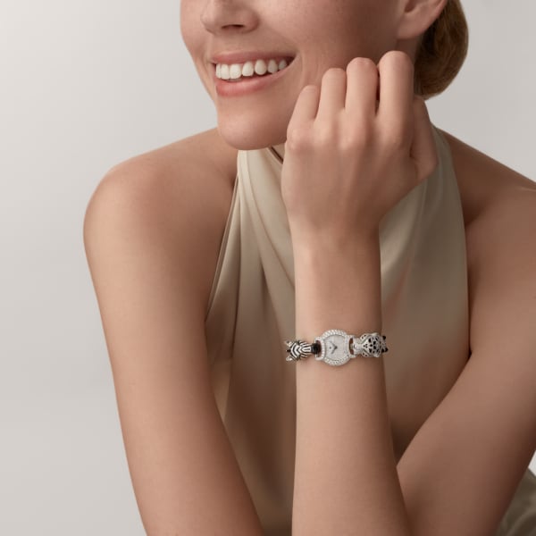 Indomptables de Cartier Watch 22.2 mm, quartz movement, rhodium-finish white gold, emeralds, diamonds, spinels, onyx, metal strap