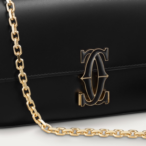 Mini chain bag, C de Cartier Black calfskin, gold and black enamel finish