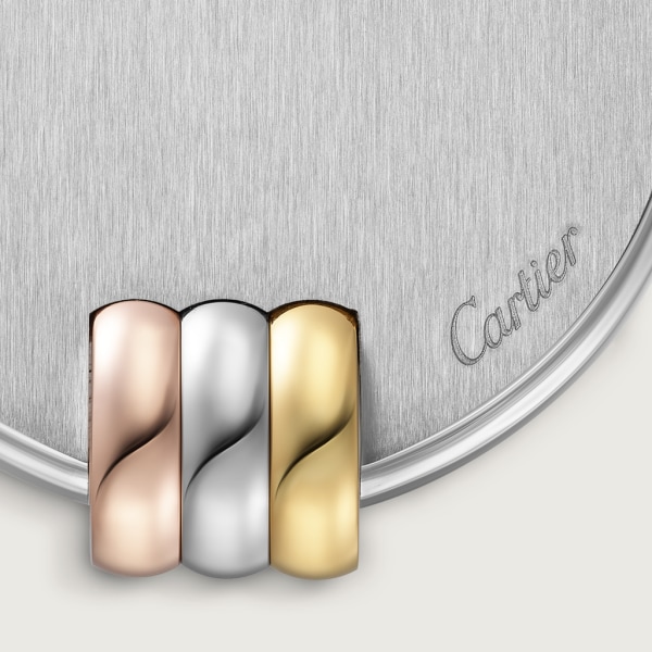 Louis Cartier Vendôme bottle opener Stainless steel, yellow and rose gold finishes.