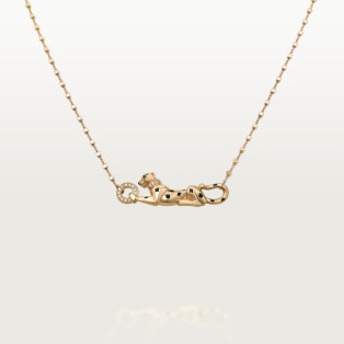 Panthère de Cartier pendant, diamonds Yellow gold, tsavorite garnets, diamonds