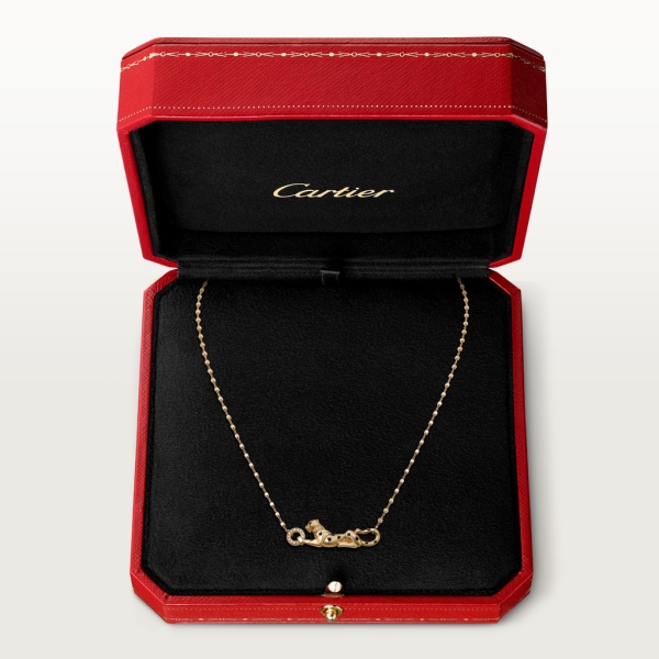 Panthère de Cartier pendant, diamonds Yellow gold, tsavorite garnets, diamonds