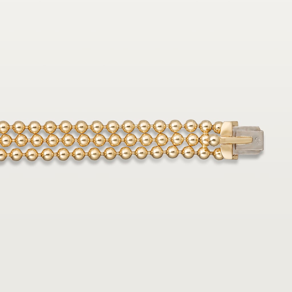 Panthère de Cartier bracelet, on a chain, diamondsYellow gold, black lacquer, onyx, tsavorite garnets, diamonds.