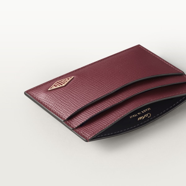 Double card holder, Cartier Losange Burgundy grained calfskin, golden finish and burgundy enamel