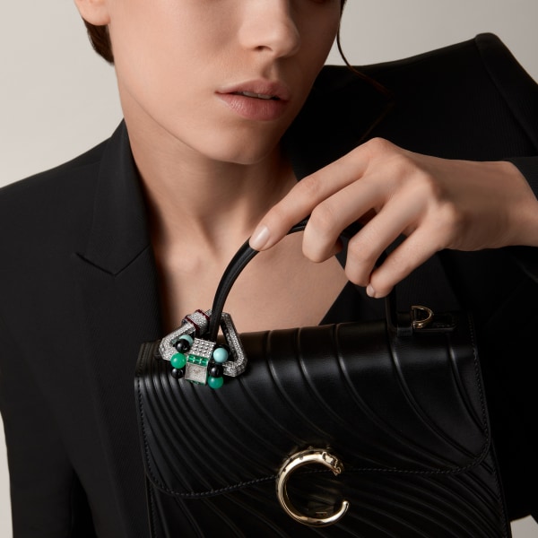 Handle bag mini model, Panthère de Cartier Black calfskin, embossed Cartier signature motif, golden finish