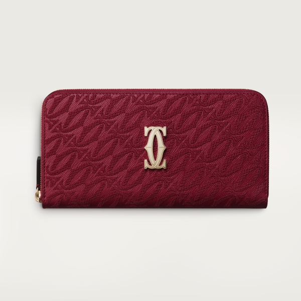 International zipped wallet, C de Cartier Cherry red textured calfskin, embroidery, golden finish