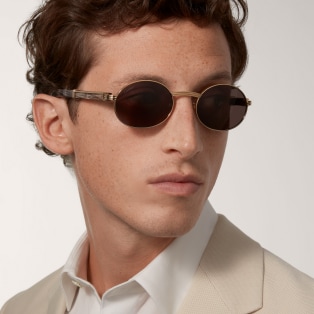 Première de Cartier Sunglasses Smooth golden-finish metal, black horn, grey lenses