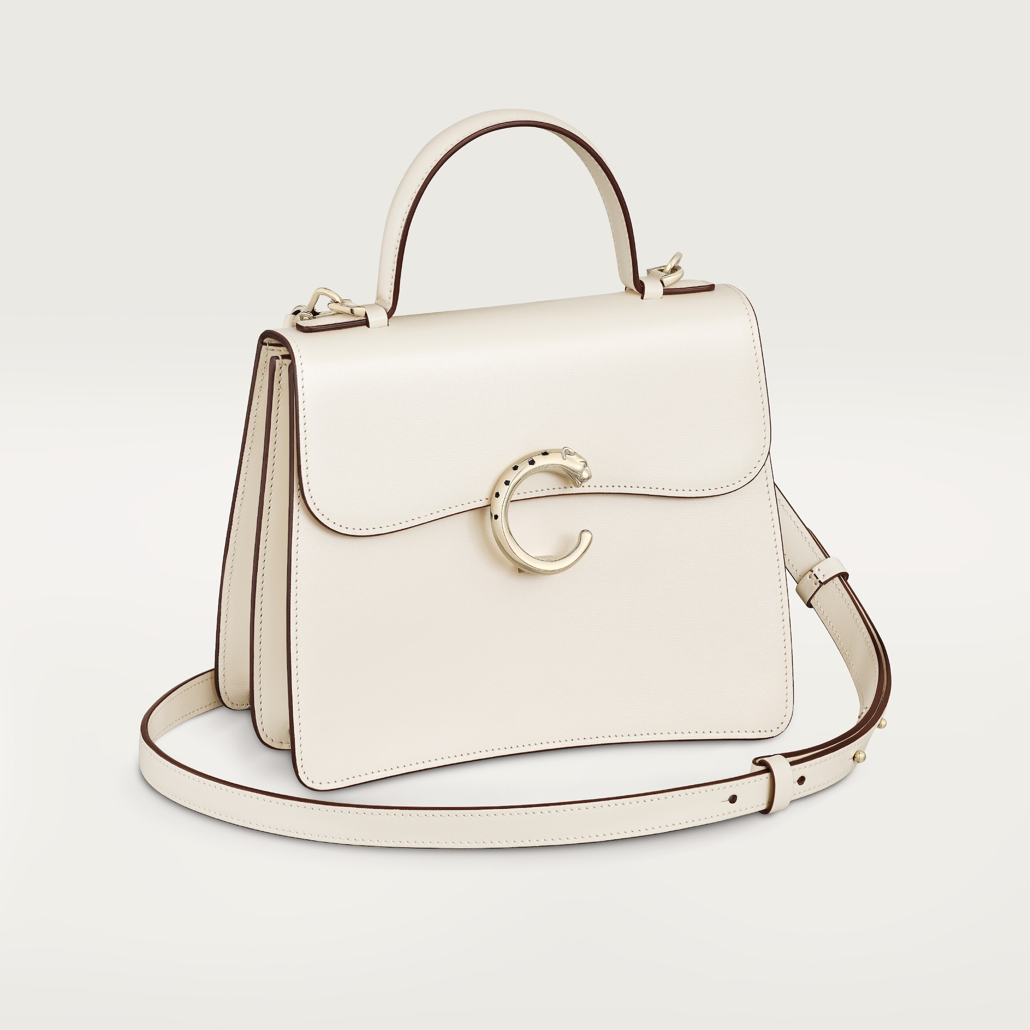 Small model handle bag, Panthère C de CartierSalt white calfskin, golden finish