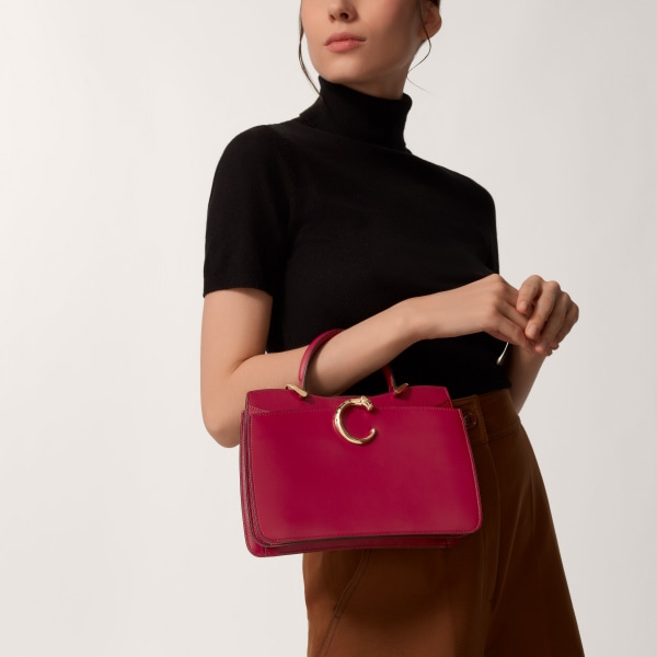 Handle bag mini model, Panthère de Cartier Cherry red calfskin, golden finish