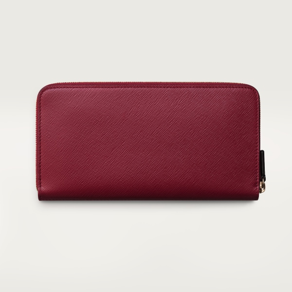 International zipped wallet, C de Cartier Cherry red textured calfskin, embroidery, golden finish