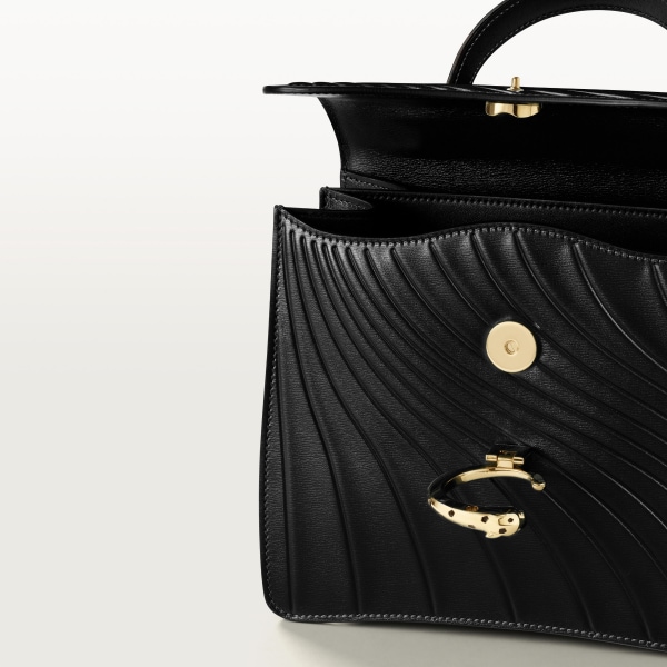 Handle bag mini model, Panthère de Cartier Black calfskin, embossed Cartier signature motif, golden finish