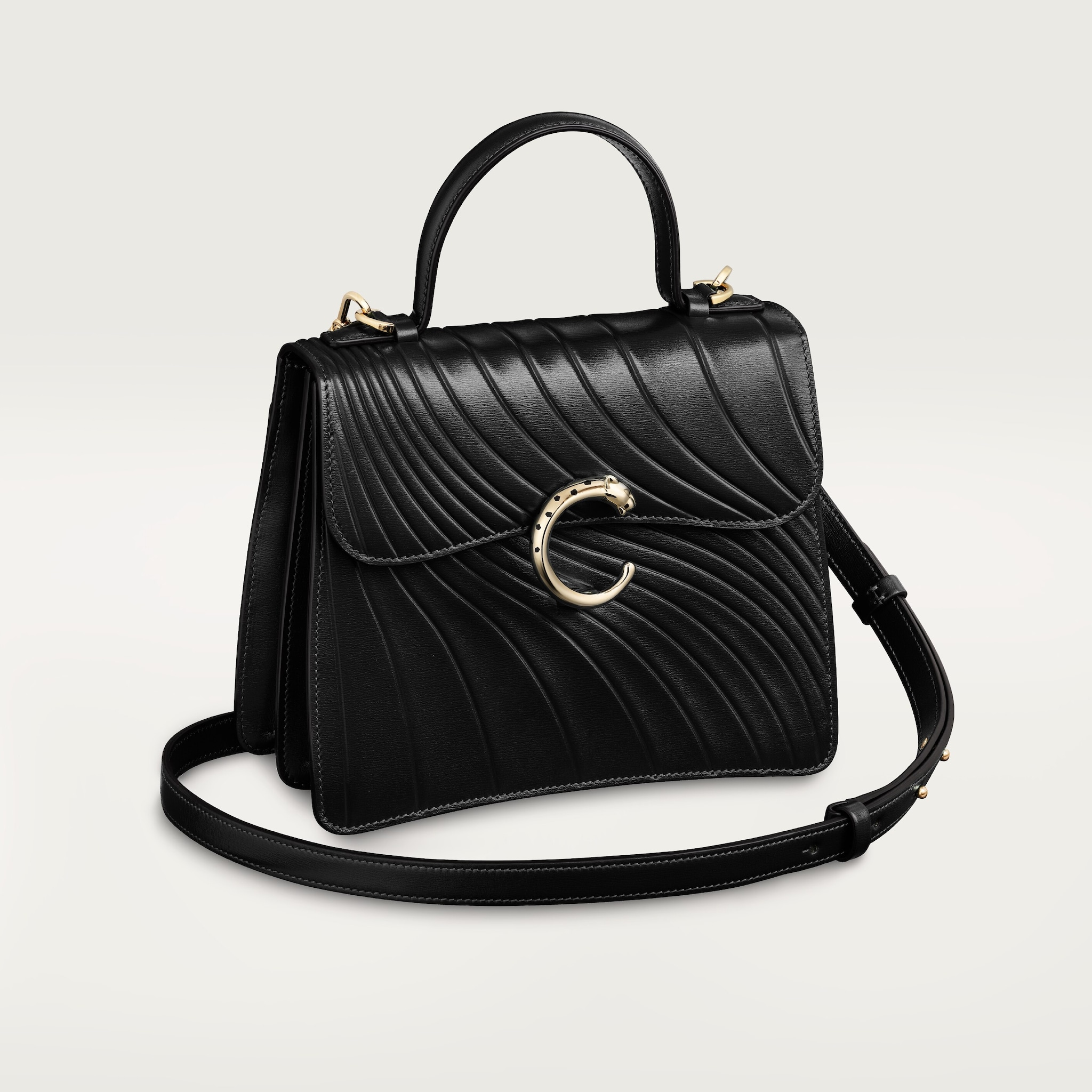 Handle bag small model, Panthère de CartierBlack calfskin, embossed Cartier signature motif, golden finish